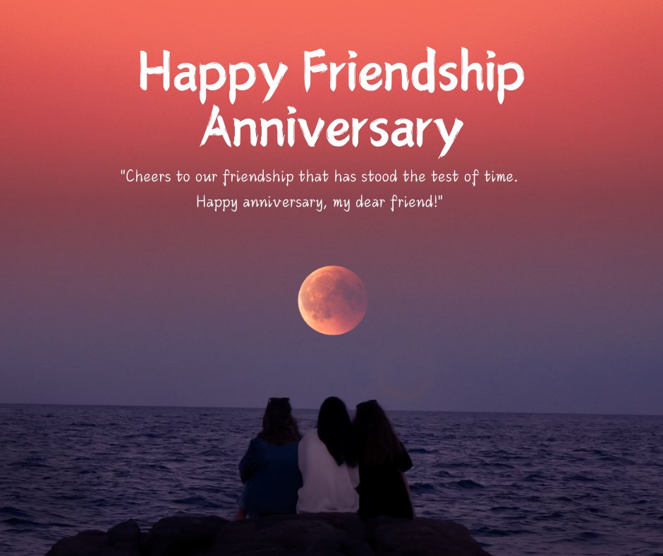 Three friends sitting on rocks by the sea, watching a stunning moonrise, with the text 'Happy Friendship Anniversary - Cheers to our friendship that has stood the test of time. Happy anniversary, my dear friend!'